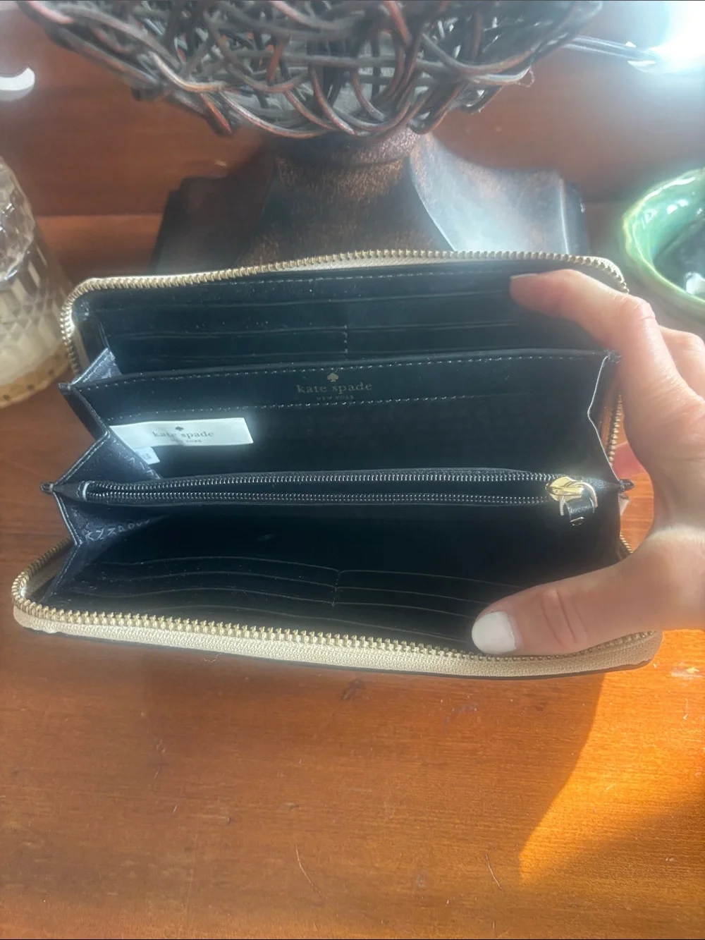 kate spade cream zip wallet with gold logo